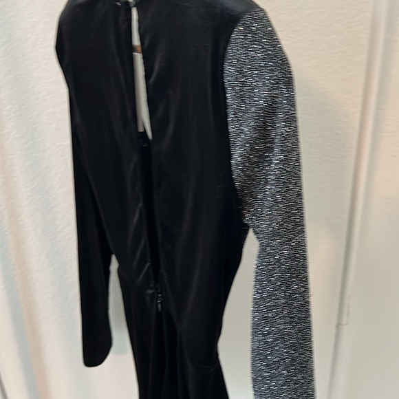 NWT. NEVER WORN. Open back long sleeve romper. - Picture 7 of 8